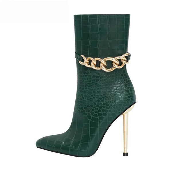 Botines de mujer verdes con punta puntiaguda y cremallera lateral, tacón fino y tacón metálico.