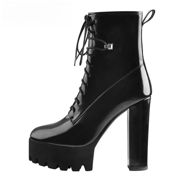 Botines de plataforma con tacón alto y punta redonda de charol negro