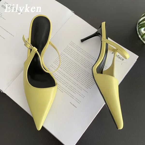 Elegantes mulas de punta puntiaguda para mujer, de moda, con tacón alto y fino.