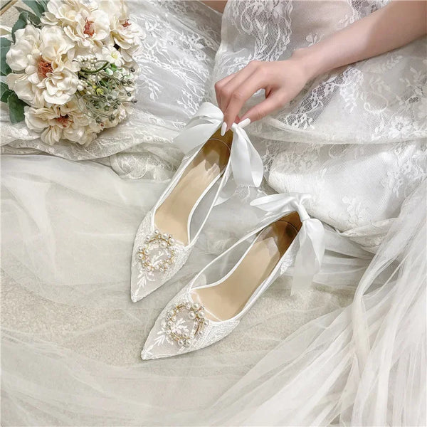 Wearing two French wedding shoes