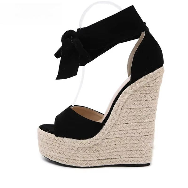Sandalias de verano con nudo de mariposa y punta abierta en color negro liso para mujer